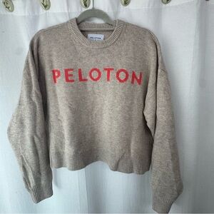 Peloton Women's Tan Sweater with Red Lettering
